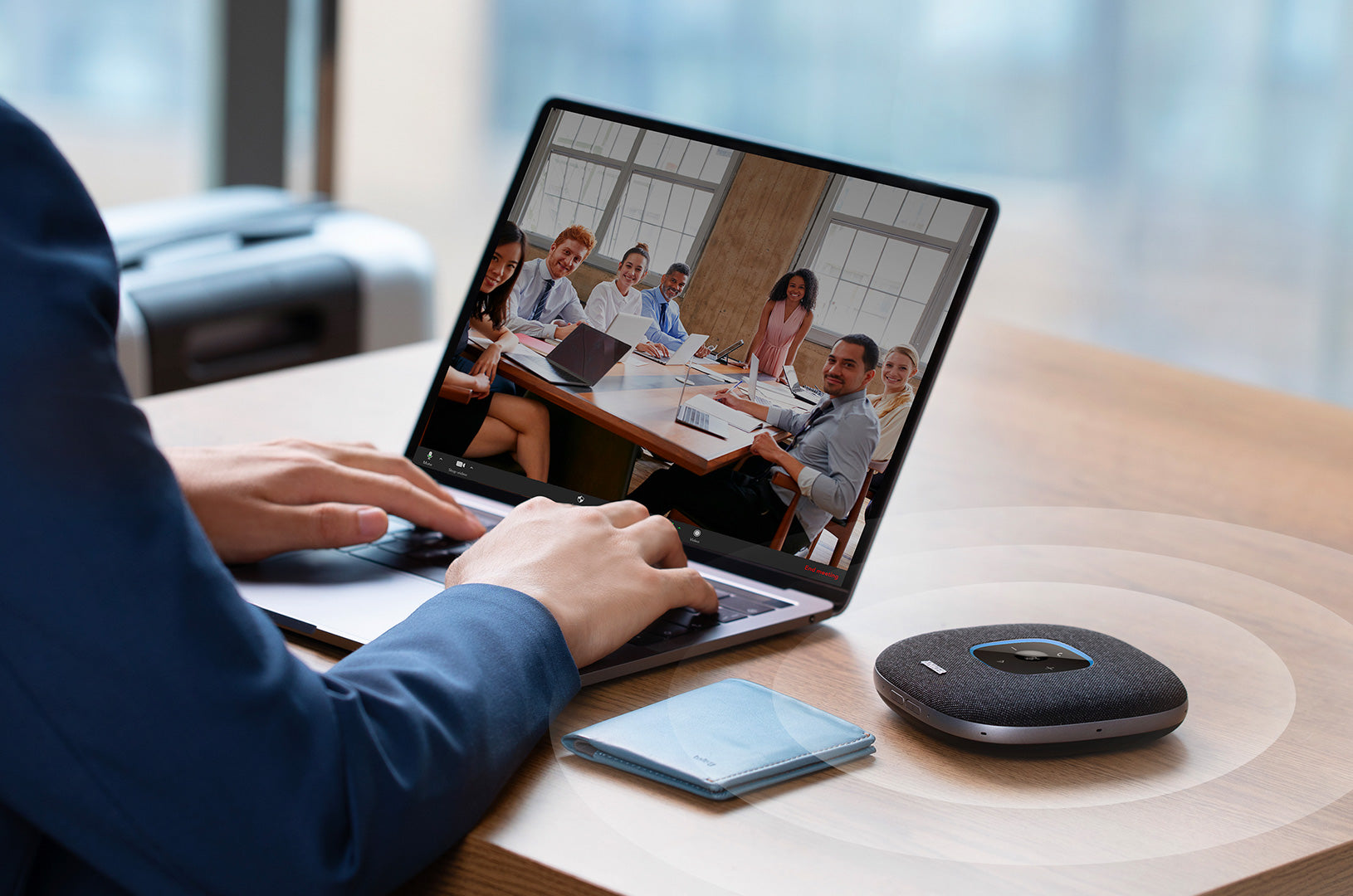 Make conference calls with a high-quality conference speaker, like Anker PowerConf S3 Bluetooth speakerphone.